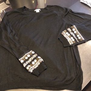 Amazing black sweater with stunning details